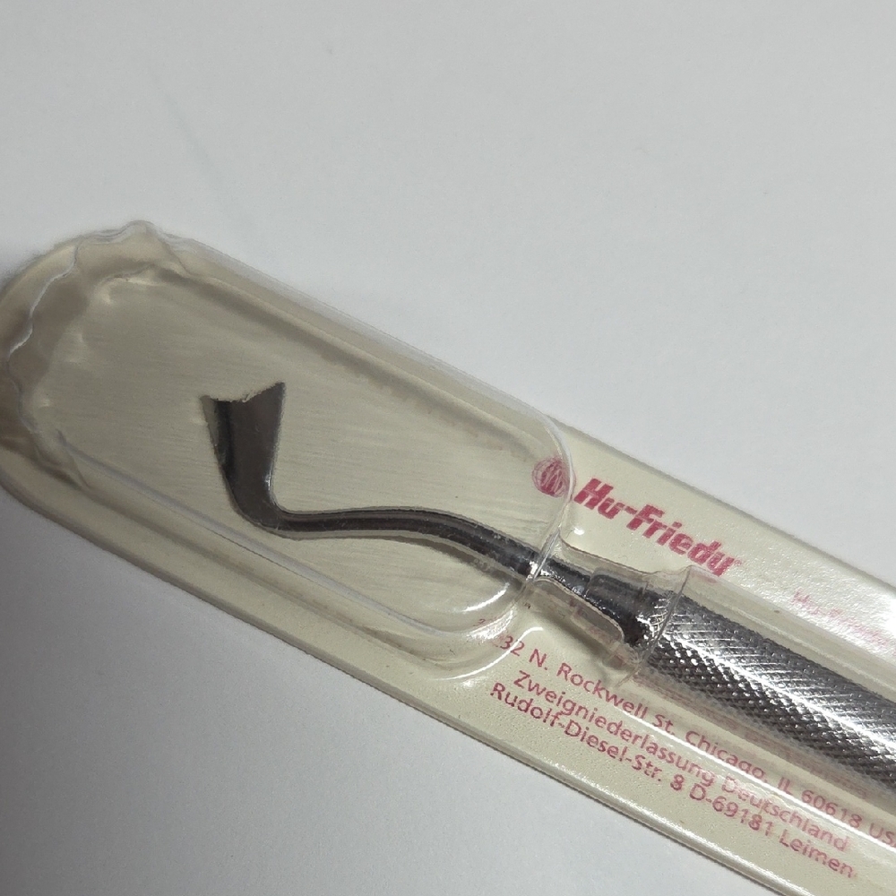 Yellow and White Gingival Retractor